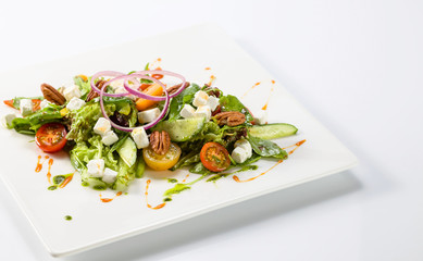 Salad with pesto sauce and mozzarella