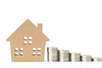 Business investment and real estate, Stack of coins money and Model house on white background,...