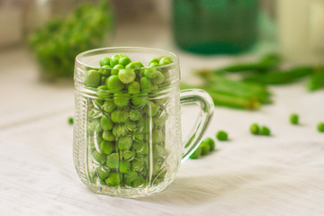 green peas, fresh and juicy vegetable (harvest). food background. top