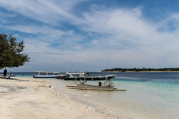 Obraz na płótnie Canvas Sandy Beach with Boats on Gili Trawangan