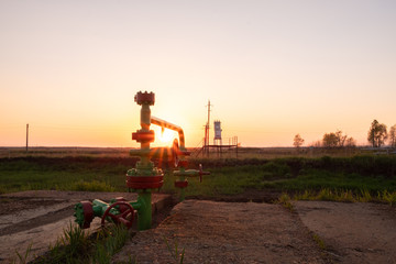 pumping oil and gas from the well. sunset pipes for oil and gas production