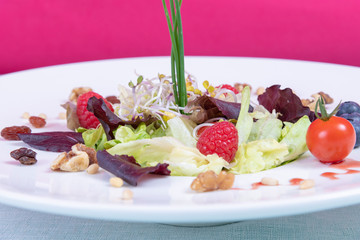 sprout beans salad, fresh lettuce, raspberry and cherry tomatoes