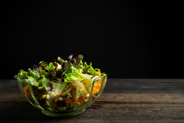 fresh vegetable salad on wooden.