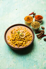 Black Eyed Kidney Beans Curry served in a bowl with Naan and rice