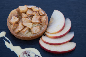 apple pie on a black slate top view