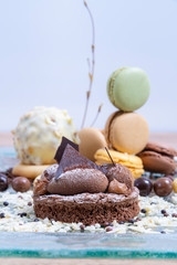 Chocolate cake and butter cream macarons