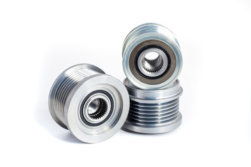 Freewheel alternator pulleys on isolated white background. Auto electrical parts.