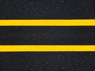 Fototapeta premium Road traffic paint Yellow on the asphalt surface