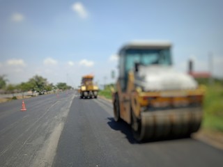 Road maintenance by burning old materials and improving quality