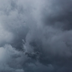 Fototapeta na wymiar detailed view on dark structured clouds