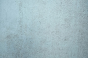 Light Blue Dirty cement wall background.