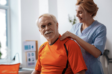 Obraz premium Joyful nice aged man feeling very well