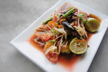 Papaya salad in dish of Thai foods.
