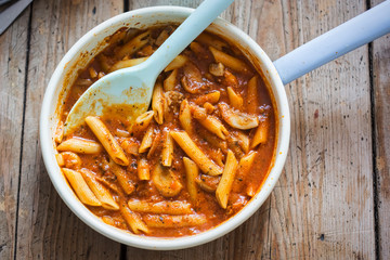 Pasta bolognese with minced beef, tomato sauce on pan