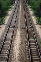 Fototapeta na wymiar railway tracks stretching into the distance. Road way.