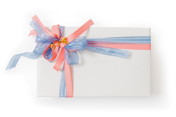 Luxury box tied with blue and pink ribbons on white background