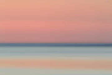 Papier Peint photo Le Morne, Maurice Abstract view of sea and horizon in Le Morne in Mauritius, Africa after sunset.