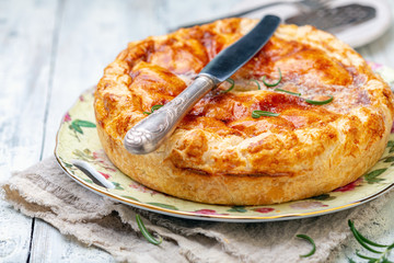 French closed pie with potatoes and rosemary.
