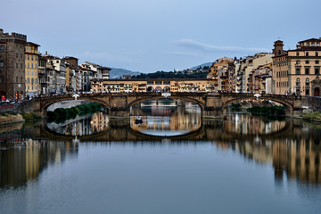Fototapeta na wymiar View of Gold Ponte Vecchio Bridge in Florence Arno river