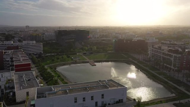 Aerial sunset over the basin Jacques coeur Montpellier Port Marianne town hall in background
