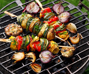 Vegetarian skewers, grilled vegetable skewers of zucchini, peppers and potatoes with the addition...