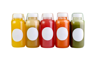 Colorful juices, smoothies, milkshakes in plastic bottles isolated on white background, top view. - Image