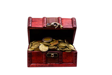 Vintage treasure chest full of golden coins isolated on white background