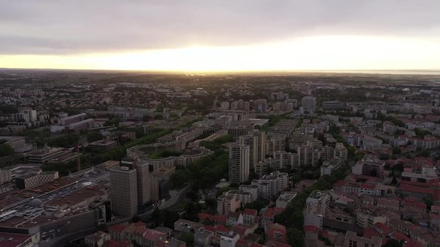 Antigone district during sunrise aerial back traveling Montpellier France