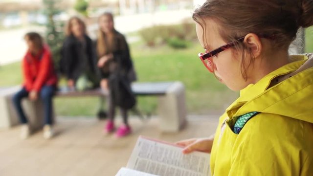 Cruel children offend the girl. Close-up, tear glasses, shouting in his face abuse, teenage bullying