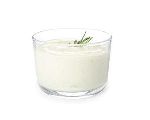 Glass bowl of garlic sauce on white background