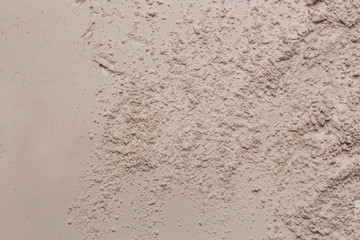 Cosmetic clay powder textured background, close up