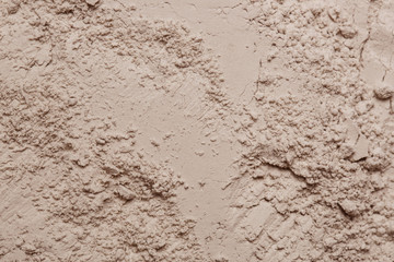 Cosmetic clay powder textured background, close up