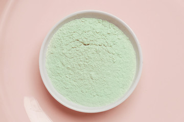 Green cosmetic clay powder. natural clay mask for face and body. 