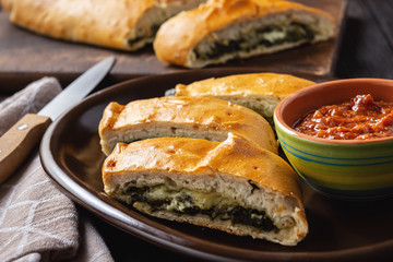 Spinach and cheese stromboli, italian cuisine. 