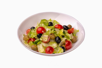 fresh vegetable salad with tomatoes and black olives