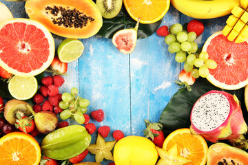 Tropical fruits background, many colorful ripe fresh tropical fruits