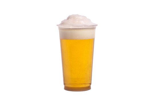 Plastic glass of beer on the white background