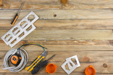 professional repairing implements for decorating and building renovation set on the wooden...