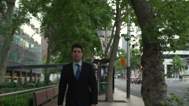 Businessman walking home after a tough day
Groomy day at work - businessman having a tough time at work