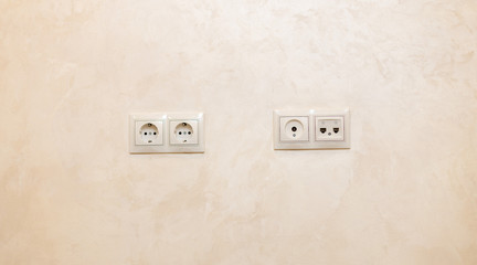 A set of two sockets, a connector for the antenna and a connector for phones mounted on the wall