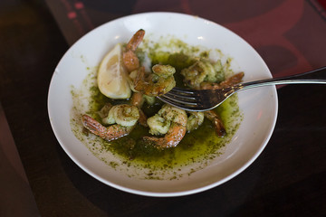 shrimps with sauce in the plate