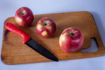apples on a cutting board