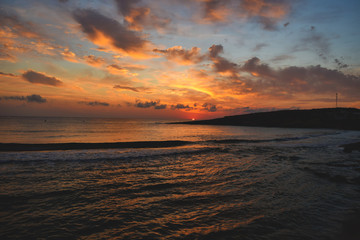 Romantic sunset sky and tropical sea at dusk