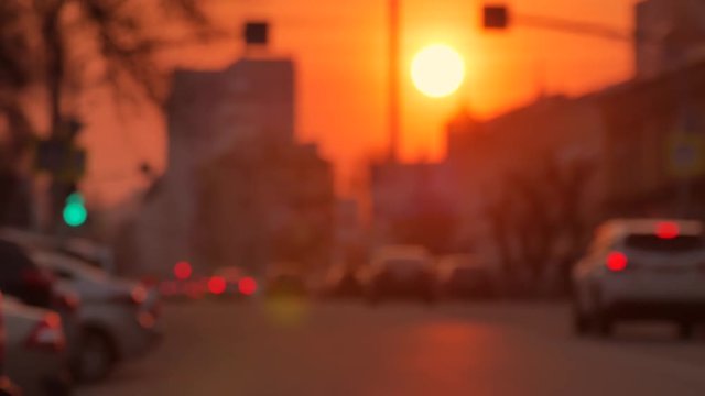 Cars are in traffic jam during a beautiful golden sunset