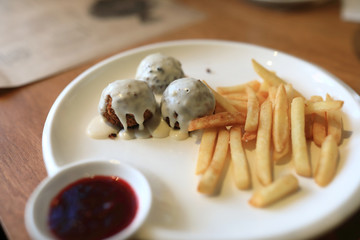 Fish Balls with french fries and sauce
