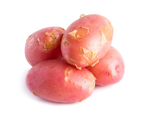 Pink potatoes on white background