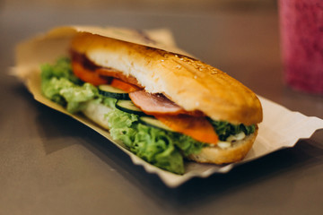 close up photo of sandwich in cafe table