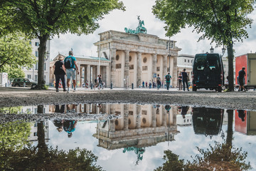 The Brandenburger Tor / Brandenburg Gate reflection in puddle, Berlin