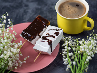 Cup of coffee and homemade marshmallows