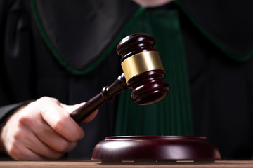 judge hits the gavel and pronunces final judgement. Law and justice concept